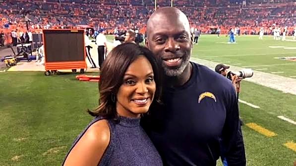 Stacey-Bell Lynn on the sideline with her husband, NFL coach Anthony Lynn